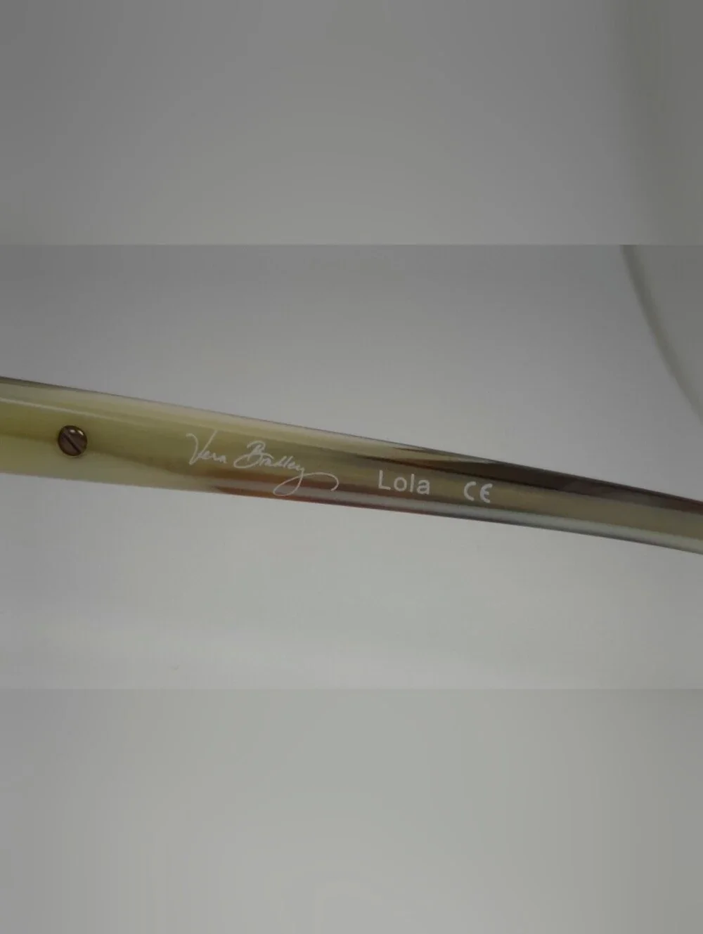 Lola. Vera Bradley Women's Semi-Rimless Glasses in Brown Matte. Small.
